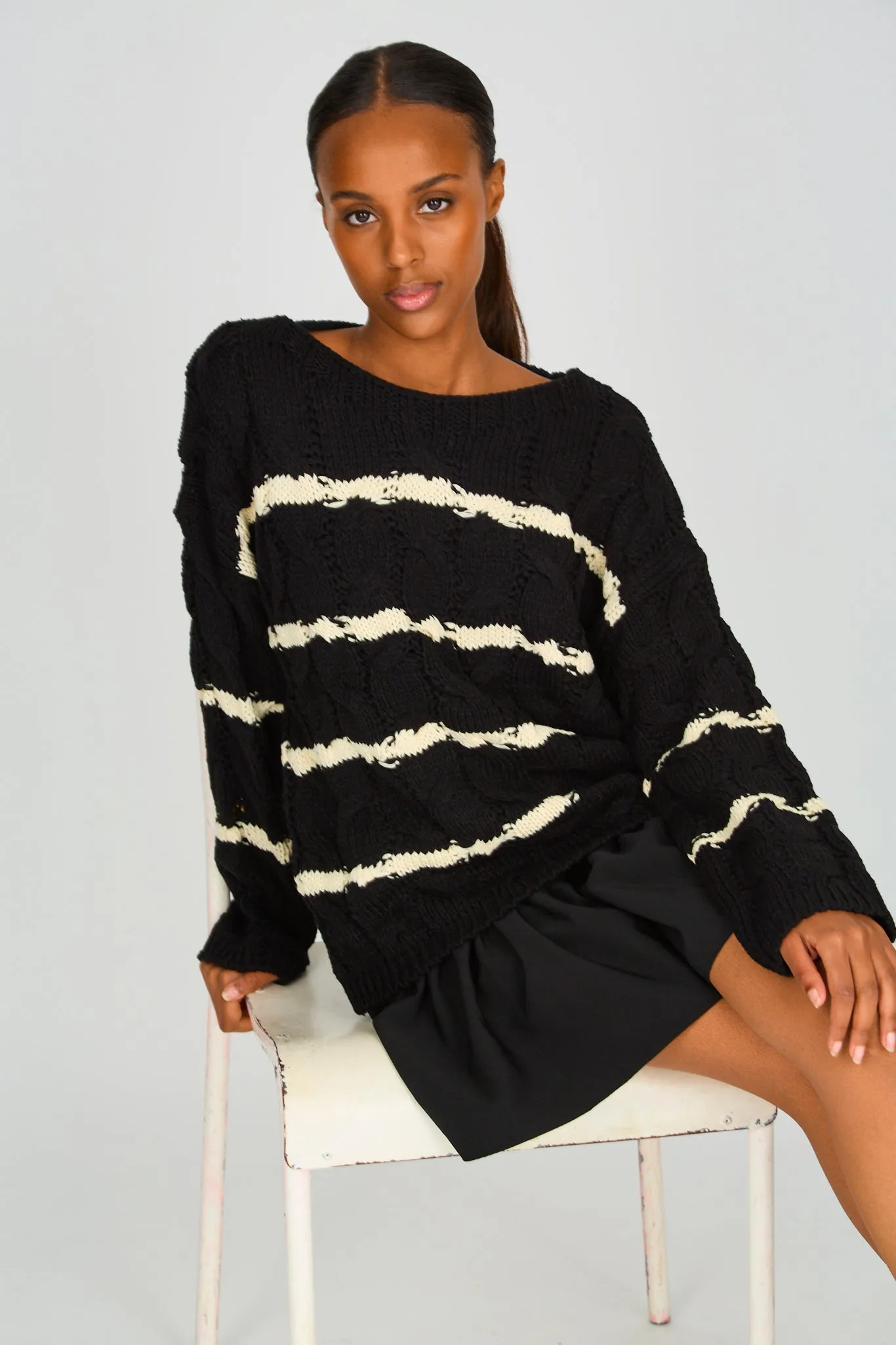 Black and white striped cable knit jumper