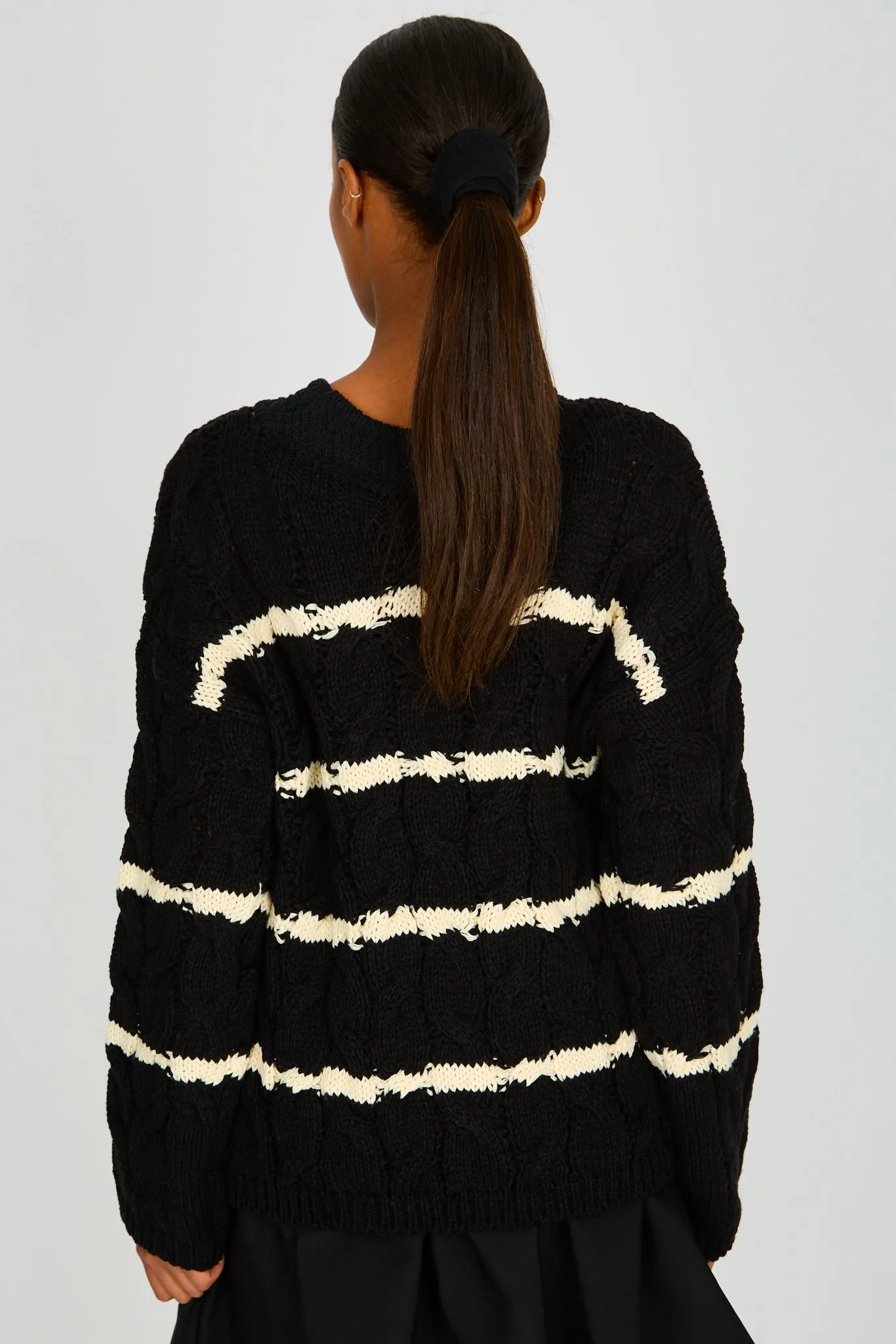 Black and white striped cable knit jumper