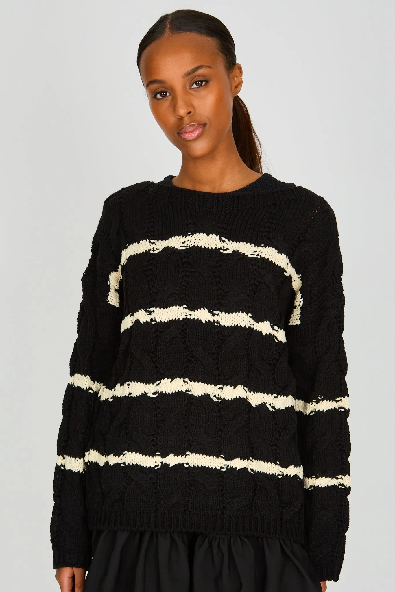 Black and white striped cable knit jumper