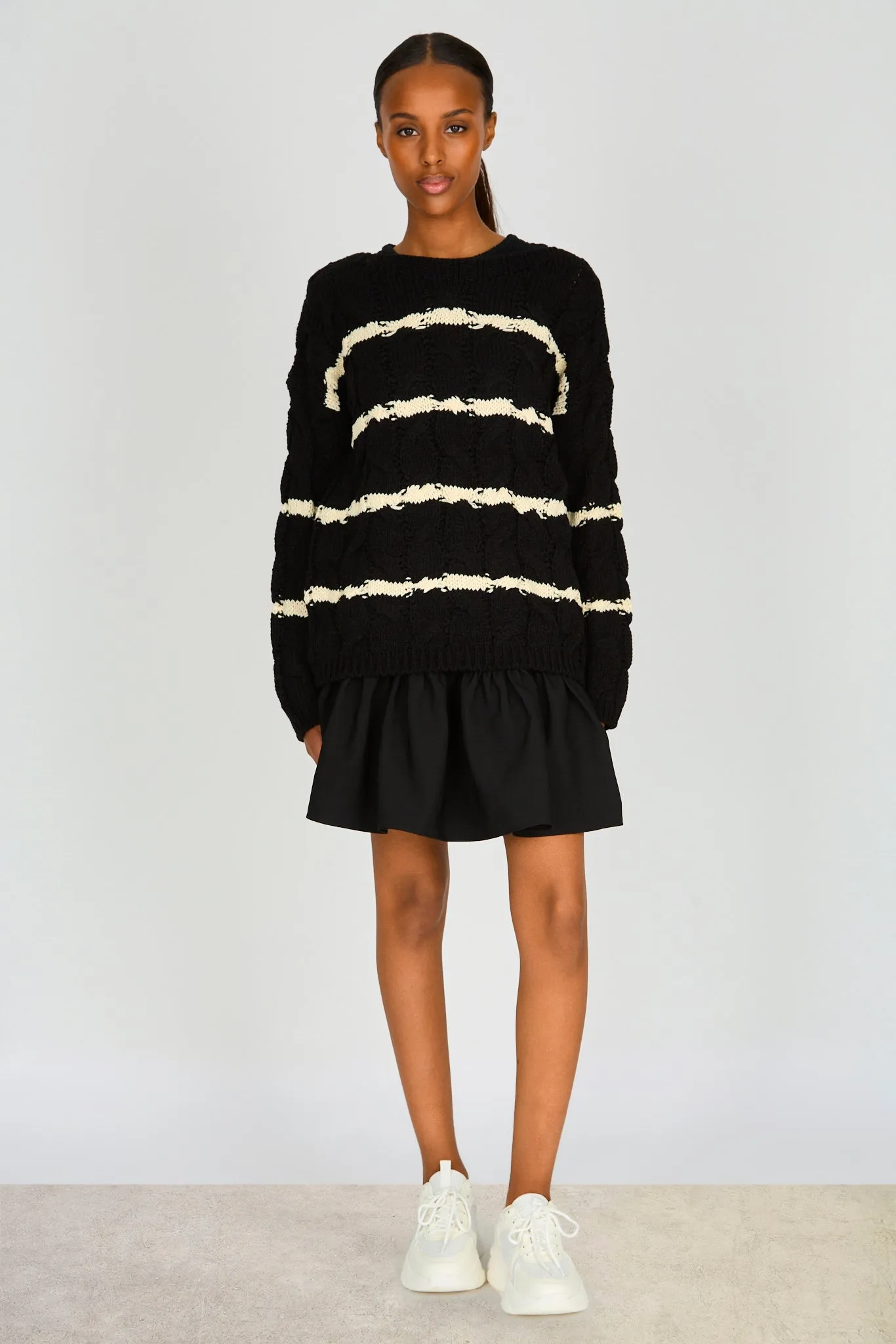 Black and white striped cable knit jumper