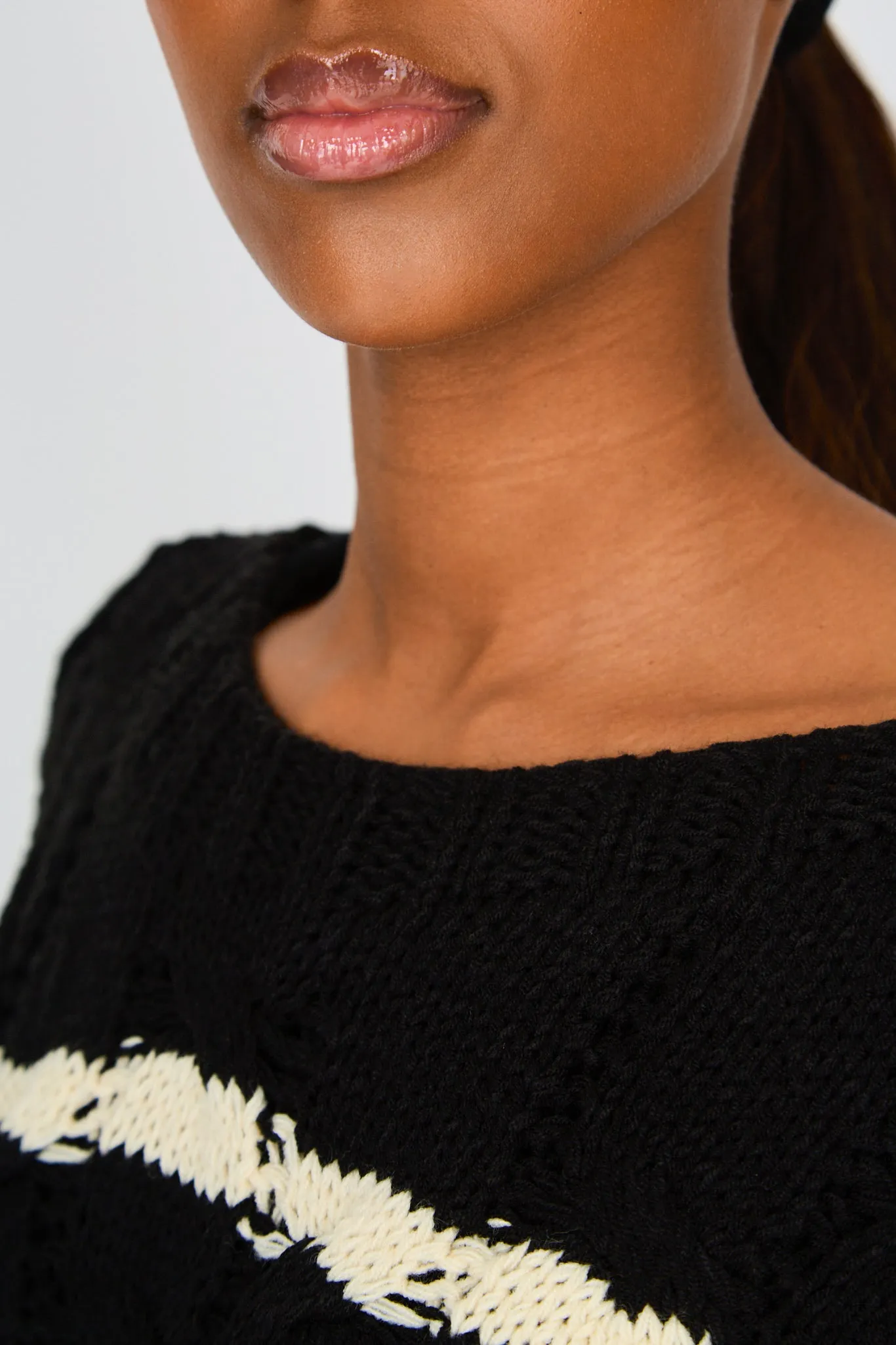 Black and white striped cable knit jumper