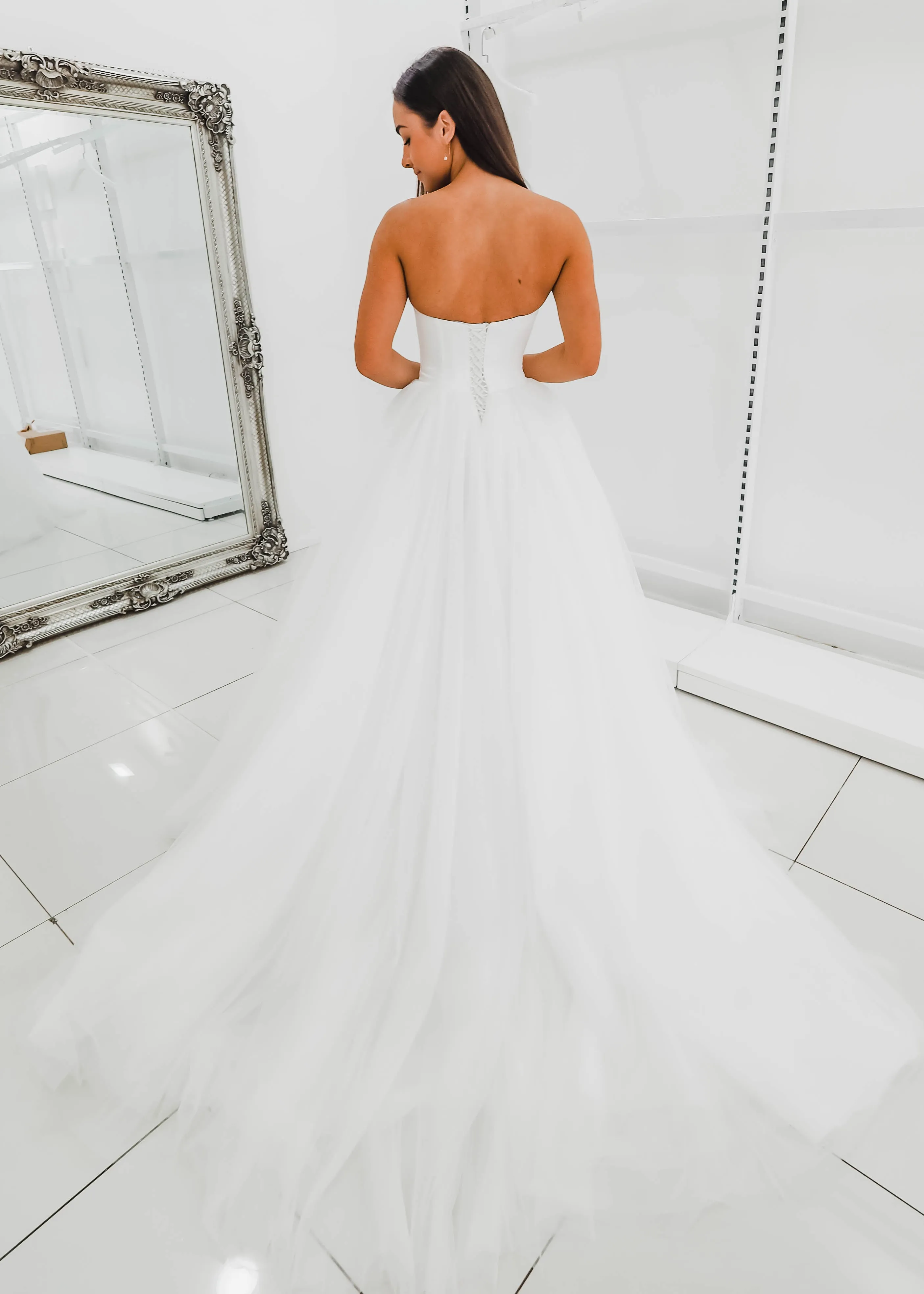 White sweetheart neckline and satin bodice with puffy tulle skirt wedding dress