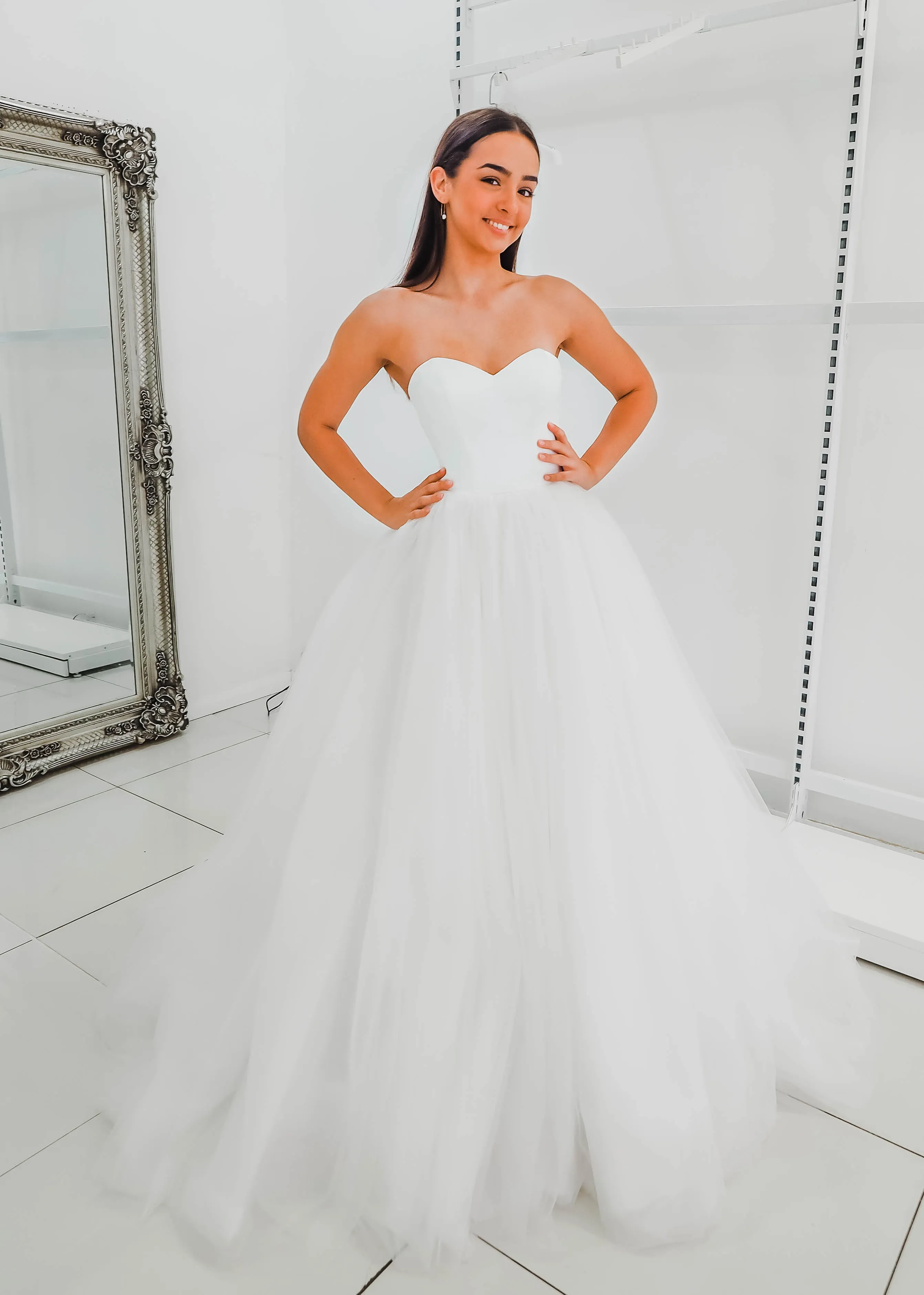 White sweetheart neckline and satin bodice with puffy tulle skirt wedding dress