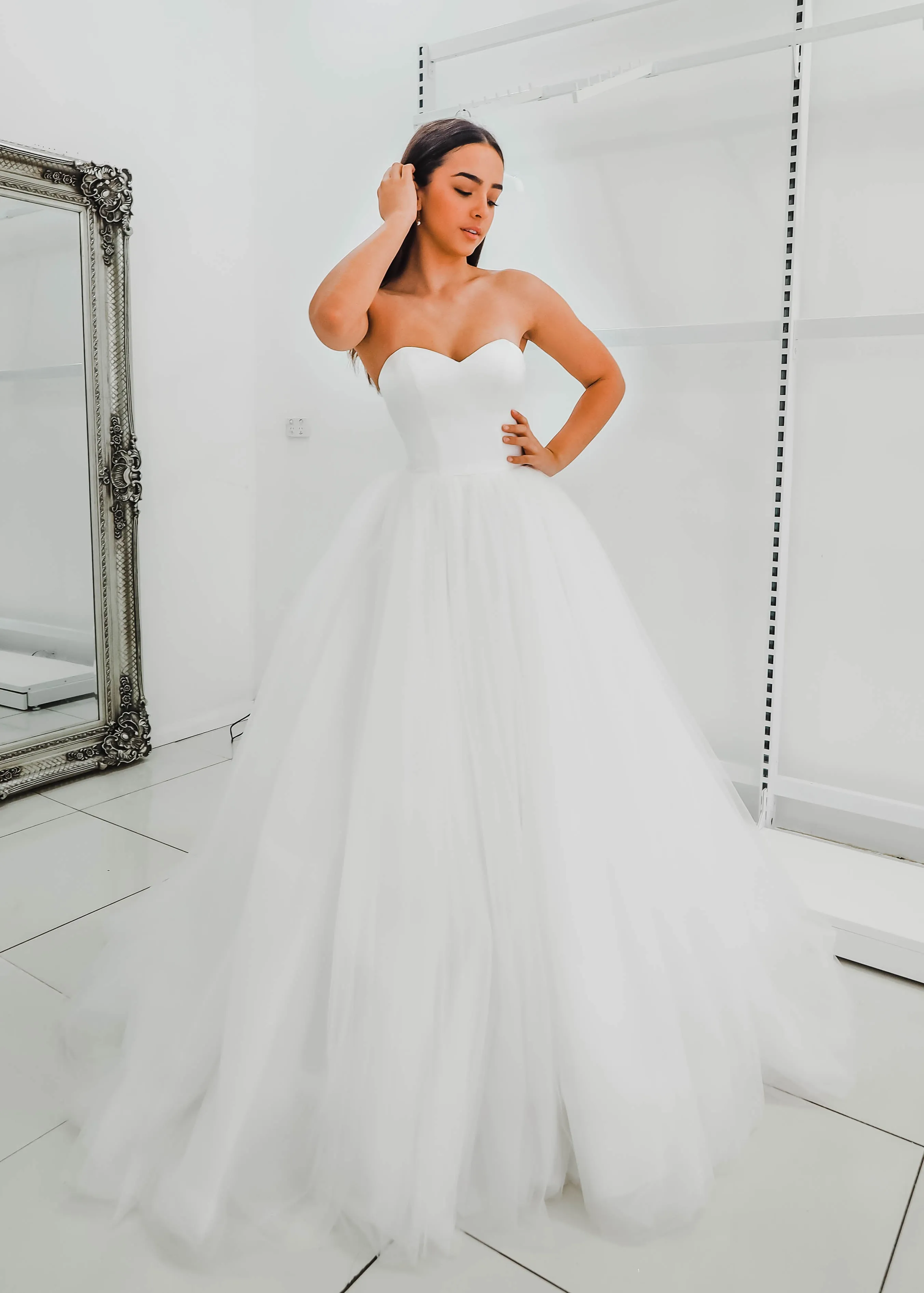 White sweetheart neckline and satin bodice with puffy tulle skirt wedding dress