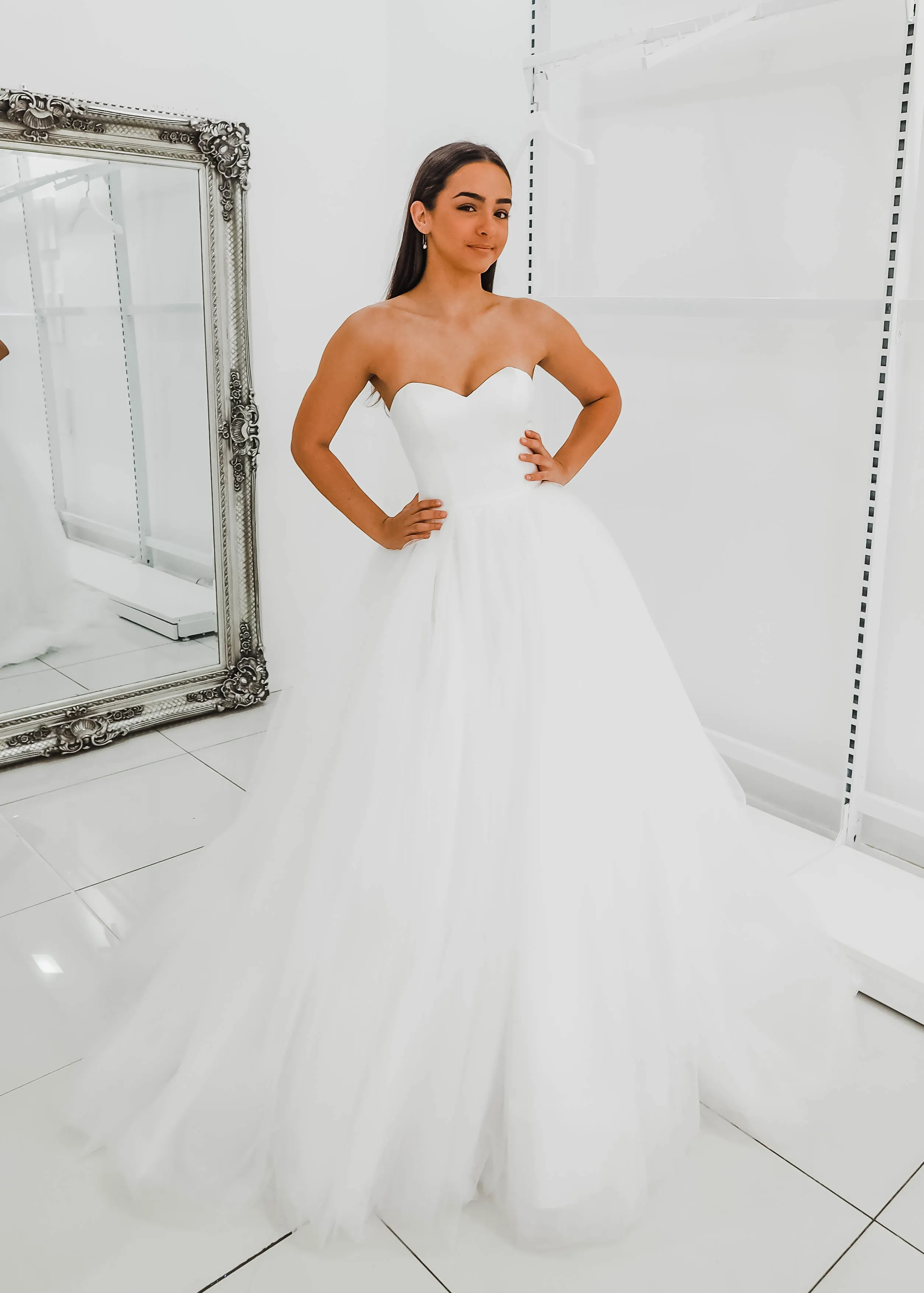 White sweetheart neckline and satin bodice with puffy tulle skirt wedding dress